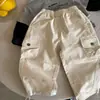 Pantalones Cargo para Niños Niños 2026 Primavera y Otoño Nuevo Estilo Pantalones Jogger Bebé Color Sólido Casual Pantalones Largos para Niñas Modernos y Versátiles