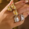 Anillo de pentágono con costuras incrustado de diamantes, estilo chic europeo y americano, venta caliente, diseño de nicho de lujo ligero, joyería chapada en acero de titanio con oro de 18 quilates
