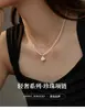 Colgante de vestido de concha con incrustaciones de diamantes, varios collares de perlas para mujer, cadena para clavícula de nicho de lujo ligero de diseñador, cadena para el cuello de lujo ligero