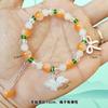 Barraca de ponto cênico vendendo joias feitas à mão com miçangas imitação de jade contas de barril pulseira de vidro atacado masculino e feminino este ano pulseira