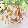 Colección de Accesorios Llavero Frijol Pin Adornos Colgantes Set Completo Paquete de Materiales diy Anillas de Resorte Argollas Abiertas Dijes para Bolsos