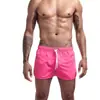 Pantalones cortos de playa de verano para hombre transfronterizos, pantalones cortos casuales holgados, pantalones cortos deportivos de tres cuartos para correr, moda de color liso, secado rápido, transpirables