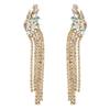 Moda europea y americana ZA pendientes de cadena de garra larga exagerada con borlas aleación de lujo ligero flor de diamante de color incrustada pendientes de cruz suministro transfronterizo
