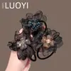 2025 Nuevo Estilo Coreano Lujo Ligero Diamante Brillante Flor de Cuatro Hojas Malla para el Cabello para Mujeres, Accesorio para el Cabello Simple de Moda y Versátil