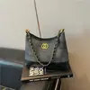 Moda Retro Nova Primavera 2026 Bolsa de Ombro para Mulheres Estilo Coreano Bolsa de Ombro Simples Bolsa Transversal com Corrente Fosca