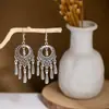 Pendientes Geométricos de Flor Europeos y Americanos Transfronterizos para Mujer, Estilo Étnico Retro, Temperamento Artístico, Pendientes de Borla Personalizados, Venta al por Mayor de Joyería