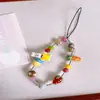 Cordón para Funda de Teléfono de Cerámica con Cuentas Estilo Cartoon Ins con un Toque de Alta Gama y Encanto de Cámara Ccd Lindo