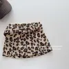 Com CintoSaia Estampada de Leopardo para Meninas Outono Inverno Saia Curta 2026 Nova Saia Evasê de Cintura Alta Saia-Calça Infantil