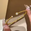 Cuentas redondas doradas simple versátil temperamento con cuentas pulsera en capas pulsera joyería de mano artículo popular de transmisión en vivo lujo ligero diseño exquisito