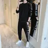 Traje de hombre primavera 2024 nuevo conjunto de suéter de cuello redondo con leggings deportivos casuales traje guapo