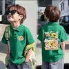 Camisa Polo Fina de Manga Curta 100% Algodão para Meninos e Meninas Verão 2026 Novo Estilo Infantil Versátil Estampada com Gola