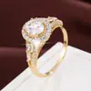 Venda Direta de Fábrica Anel Torre de Bolo em Camadas com Zircônia Redonda de Quatro Garras, Anel Feminino de Cobre Puro de Alta Qualidade, Exclusivamente para Vendas Transfronteiriças