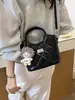 Bolso bandolera nuevo y moderno para ir al trabajo, bolso de mano, bolso de moda, bolso tipo cubo de primavera, bolso sencillo para mujer, diseño exclusivo acolchado