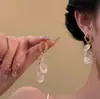 Novos Brincos Populares Longos com Franjas de Concha Feitos à Mão com um Toque de Luxo Leve, Simples, Sofisticado e de Alta Qualidade