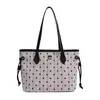 Bolso de mano elegante y de alta gama de gran capacidad para mujer, nueva colección 2026, adecuado para el trabajo diario, con diseño de lunares y rayas, y se puede llevar como bolso de hombro o bolso tote