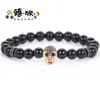 Pulseira Masculina de Pedra Vulcânica Redonda 8mm com Caveira Micro-Incustada Fosca - Melhor Venda Transfronteiriça da Amazon - Atacado