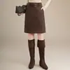 Falda de gamuza talla grande para mujer, nuevo estilo otoño e invierno 2026, falda bodycon de cintura alta que estiliza, falda corta elegante para la oficina