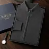 Suéter cárdigan de cachemira para hombre de cuello alto medio para otoño e invierno, chaqueta de punto gruesa de lana con cremallera de moda, top holgado