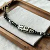 Collar con Colgante de Diente de Tigre Natural Genuino de Xizang Ojo Tres-Nueve Estilo Xizang Colgante de Ágata Pura para Hombres y Mujeres