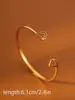 Pulseira em aço inoxidável em formato de coração transfronteiriça, pulseira de cruz banhada a ouro 18k à prova d'água, acessório de borboleta de alta qualidade europeu e americano para mulheres