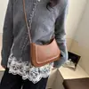 Bolso de Hombro Texturizado de Color Sólido de Moda para Mujer 2026 Nuevo Estilo Casual de Media Luna con Lazo Bolso Versátil