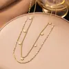 Design Europeu e Americano Novo Pingente Simples Brilhante de Estrela de Cinco Pontas Dupla Camada Colar Dupla Camada Feminino de Aço Titânio Não Desbota