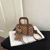 Bolso coreano de nicho de lunares para mujer, nuevo bolso cruzado versátil 2026, bolso de mano de alta gama, bolso almohada, bolso cilíndrico