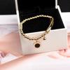 Pulsera de corazón para niña diseño nicho ins网红 números romanos cuentas de la suerte pulsera de acero de titanio para mujer todo-combinable moda amigas