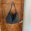 Bolso retro de leopardo de nicho transfronterizo para mujer, nuevo modelo 2026, gran capacidad, moderno y versátil, adecuado para ir al trabajo, bolso de hombro y bandolera