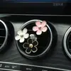 Aromaterapia para Coche Salida de Aire Acondicionado Decoraciones Decoración Perfume Suministros para el Interior del Coche Flores de Cinco Pétalos Cruz de Metal Transfronterizo