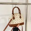 Bolsa de Concha Retrô Francesa de Nicho Feminina 2025 Nova Moda Estilo Hong Kong High-End Bolsa Feminina de Ombro Único Transversal