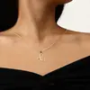 Europa y Estados Unidos transfronterizo 26 letras conjunto de cobre circonita cadena de serpiente redonda collar letras colgante de oro creativo simple letras