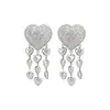 Brincos Europeus e Americanos de Agulha de Prata com Coração Cravejado de Diamantes e Borla 2026 Novo Estilo Estética Fria Personalidade Tarraxas de Orelha Nicho Toque de Luxo Ornamentos de Orelha
