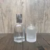 En stock B115-30ml50ml100ml botella de perfume de vidrio transparente, botella de recarga cosmética/botella vacía con spray de presión