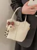 2026 Bolsa Casual da Moda Estilo Novo com Textura Simples e Moderna, Bolsa Saco para Inverno, Bolsa de Ombro e Transversal Personalizada para Mulheres