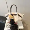 2025 Nuevo Retro Esmerilado Mini Bolsa Cesta de Verduras Bolso de Hombro Cruzado Tote para Mujer Nicho Portátil Bolsa Dumpling