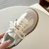 Zapatillas de entrenamiento alemanas de primavera para niños, nuevo modelo 2026, zapatillas de moda para niñas, versión coreana de zapatillas blancas con lentejuelas de estrella, zapatillas deportivas de moda