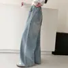 Jeans de mezclilla para niñas primavera y otoño 2026 nuevo estilo coreano casual para niños de talla mediana y grande con onda lateral y pedrería brillante
