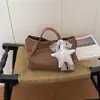 Bolso de Hombro Tejido de Moda Europeo y Americano 2026 Verano Nuevo Casual Gran Capacidad para Viajes Cotidianos Versátil Elegante Versión Coreana para Mujer
