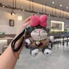 Nuevo Llavero de Peluche con Lazo Muñeca Lucy Lindo Gato Francés Pequeño Moda Popular Colgante Decoración de Bolso para Mujeres