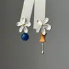 Pendientes de Flor Asimétricos Creativos de Nicho para Mujer, Diseño Único Estilo Ins, Pendientes Minimalistas de Alta Gama al por Mayor