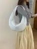 Bolsa feminina 2026 novo modelo, bolsa tote nicho casual simples leve de grande capacidade, versátil para uso diário e deslocamento, bolsa em formato de crescente