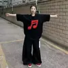 Camiseta Versátil de Manga Curta em Algodão Puro Estilo Americano com Estampa de Nota Musical para Homens e Mulheres, Top Simples e Versátil para o Trabalho para Casais
