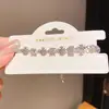 Pulseira de cruz com zircônia estilo ins coreano, pulseira de nicho de luxo leve de alta qualidade, joias da moda e versáteis para atacado