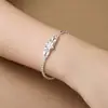 Pulsera auténtica de cobre plateado niche flor doble exquisita ajustable para mujer comercio electrónico en vivo suministro de fábrica venta al por mayor