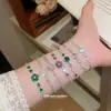 Pulsera de Metal con Corazón y Flor de Circonita Super Brillante, Lujo Ligero, Gama Alta, Elegante, Moderna, Joyería de Mano Exquisita y Versátil para Mujeres