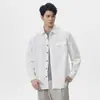 Camisa de manga larga simple de color liso para hombre, marca moderna estilo americano, nuevo modelo de primavera, cuello de solapa, corte holgado, casual, algodón puro, top de talla grande