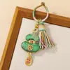 Nuevo Canto brocado calabaza borla hebilla de anillo colgante DIY ventilador hecho a mano llavero accesorios colgante en stock venta al por mayor