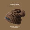 Gorro de punto ensanchado de talla grande para hombres y mujeres, de la misma moda, genial, con parche de lana que combina con todo, gorro cálido con protección para las orejas para otoño e invierno.