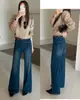 Otoño TOP estilo europeo Guangzhou Trece Líneas bolsillo doble versátil jeans acampanados elásticos 360 grados con cinturón 13355